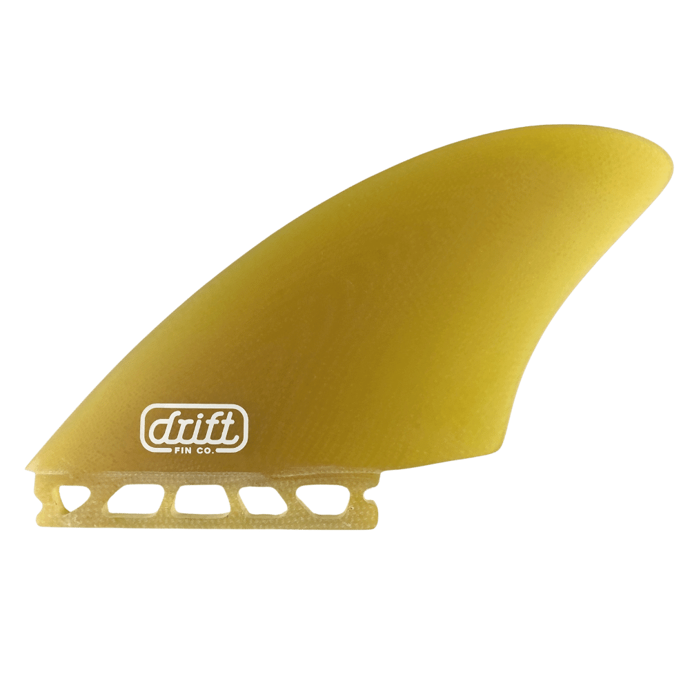 A golden colored surfboard keel fin, radiating energy and excitement. The fin boasts a golden color color, adding a vibrant touch to the surfboard. Positioned near the tail, the keel fin provides stability and enhances maneuverability, allowing for an exhilarating and dynamic surfing experience.